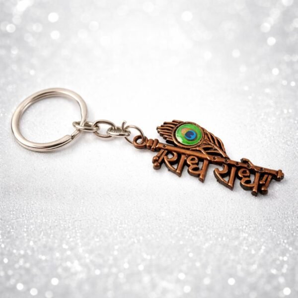 Radhe Radhe Copper Finish Metal Keychain with Mor Pankh Design – Divine Krishna Inspired Key Ring radheradhe-metal-keyring-jyotishshop